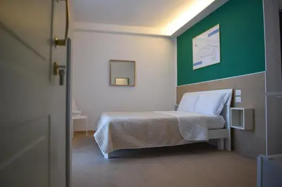 Letto o letti in una camera di Napoli Central Gate
