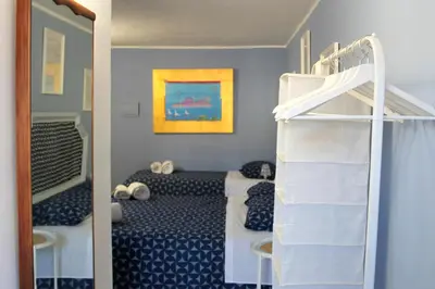 Letto o letti in una camera di Casa Avallone