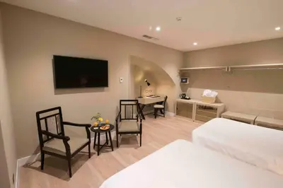 Letto o letti in una camera di Caruso Place Luxury Rooms & Suites