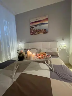 Letto o letti in una camera di Home Sweet Home Bella Napoli