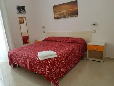 Letto o letti in una camera di Napul'è
