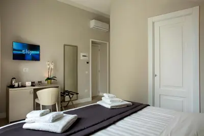 Letto o letti in una camera di Naplesuite