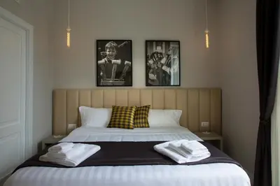 Letto o letti in una camera di Naplesuite