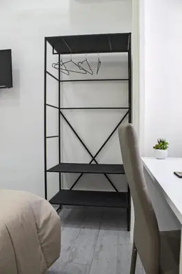 Letto o letti in una camera di Amare Napoli