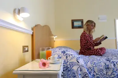 Letto o letti in una camera di Santa Lucia 50