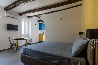 TV o dispositivi per l'intrattenimento presso Napoli Suite Toledo 10 By Dimorra