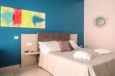 Letto o letti in una camera di Toledo 16 Luxury Suites