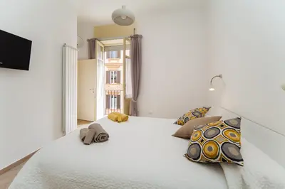 Letto o letti in una camera di Napoli Centro Suite - Duomo Apartment