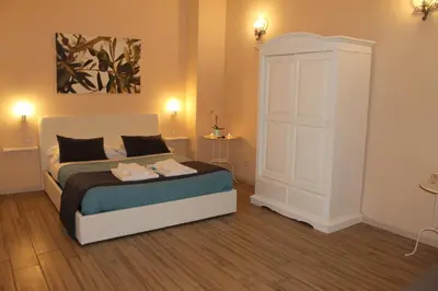 Letto o letti in una camera di Da Polly a Piazza Amedeo
