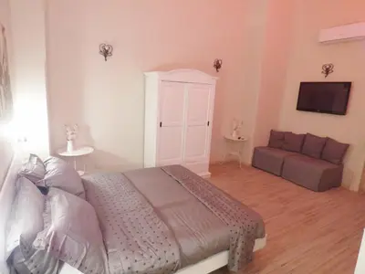 Letto o letti in una camera di Da Polly a Piazza Amedeo