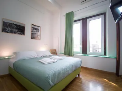 Letto o letti in una camera di Maison Arena Bovio