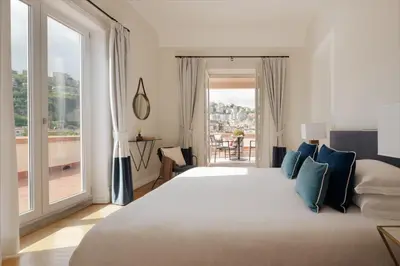 Letto o letti in una camera di Caracciolo 13 Rooftop & Suites