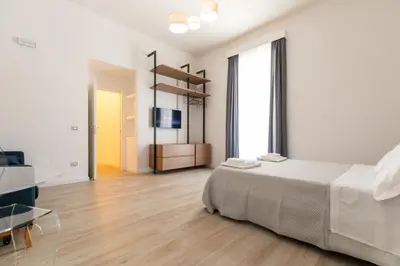 Letto o letti in una camera di Palazzo Della Porta