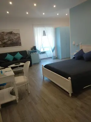 Letto o letti in una camera di Suite Napoletana