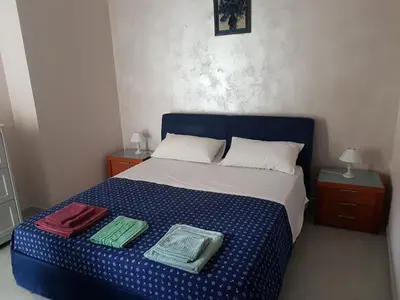 Letto o letti in una camera di Delby's house