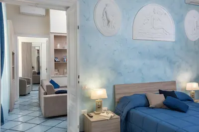 Letto o letti in una camera di Residenza Santa Lucia a Mare