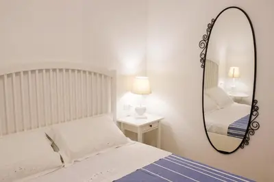 Letto o letti in una camera di O' Vascio Chic