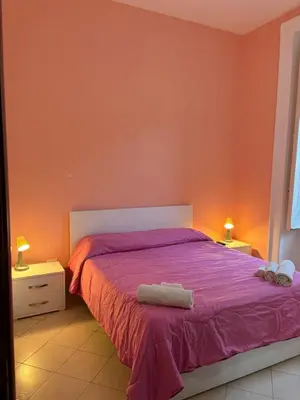 Letto o letti in una camera di B&B LA CONIGLIERA
