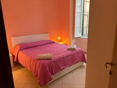 Letto o letti in una camera di B&B LA CONIGLIERA