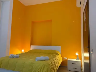 Letto o letti in una camera di B&B LA CONIGLIERA
