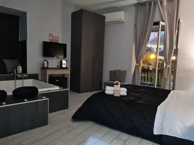 Letto o letti in una camera di ESPOSITO PLAZA- ROOMS & SUITE