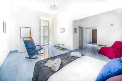 Letto o letti in una camera di GOCCE VILLAS - Il Limoncello Historical center of Naples