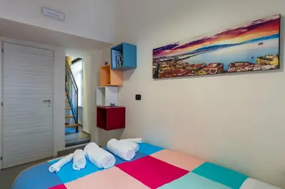 Letto o letti in una camera di #Casa Totò - L'Oro di Napoli