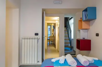 Letto o letti in una camera di #Casa Totò - L'Oro di Napoli
