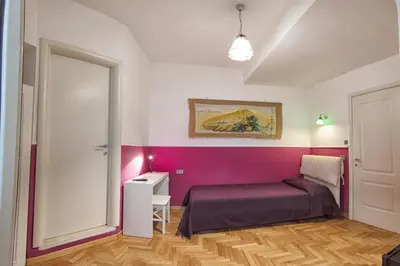 Letto o letti in una camera di B&B Cappella Vecchia 11