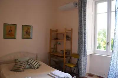 Letto o letti in una camera di Casa Arcoiris