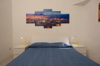 Letto o letti in una camera di Geco's Apartment