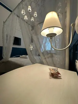 Letto o letti in una camera di B&B Pantarei Napoli