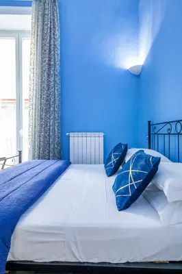 Letto o letti in una camera di PALAZZO MAjORANA