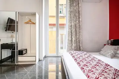Letto o letti in una camera di PALAZZO MAjORANA