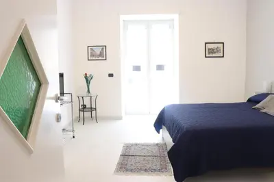 Letto o letti in una camera di A tre passi dal Duomo