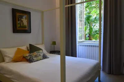 Letto o letti in una camera di Casa Roger