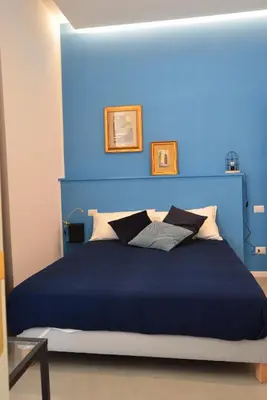 Letto o letti in una camera di Casa Roger