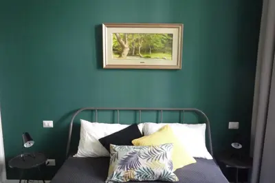 Letto o letti in una camera di Casa Roger