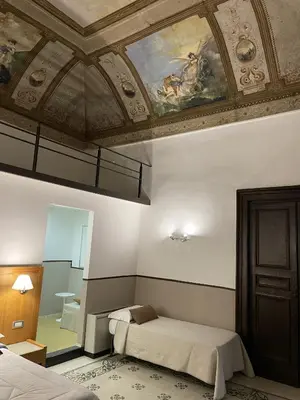 Letto o letti in una camera di Resort CostantiNapoli 27