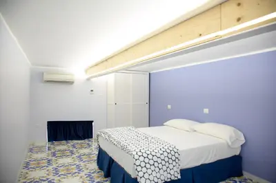 Letto o letti in una camera di Casa Niccolò