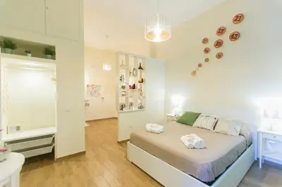 Letto o letti in una camera di Casetta Partenopea Holiday House