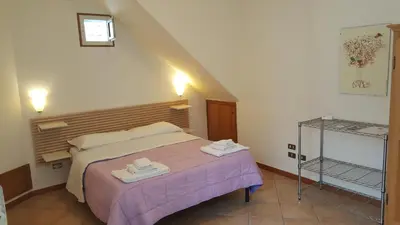 Letto o letti in una camera di Bed and Breakfast I Vicoletti Di Napoli