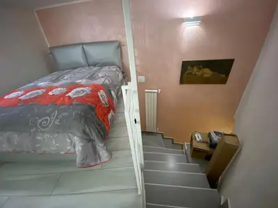 Letto o letti in una camera di Casa D'Amore