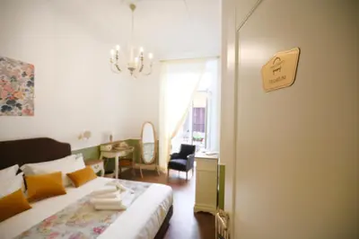 Letto o letti in una camera di Macchiato Suites Boutique Guest House