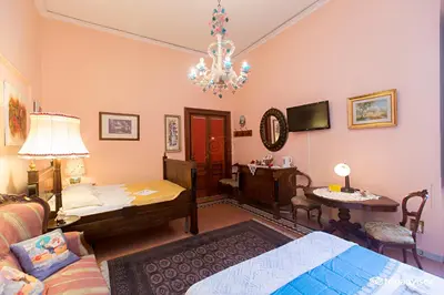 Letto o letti in una camera di B&B Atmosfere Del Centro Storico