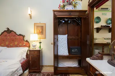 Letto o letti in una camera di B&B Atmosfere Del Centro Storico