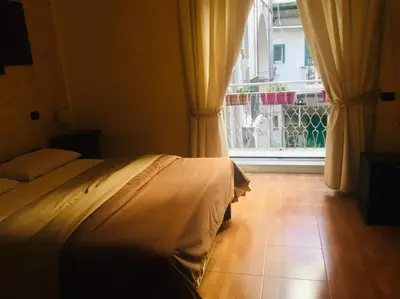 Letto o letti in una camera di B&B Alloggio Maria