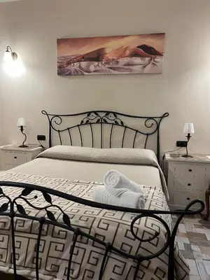 Letto o letti in una camera di B&B La Dimora Di Nettuno