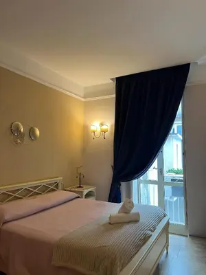 Letto o letti in una camera di B&B La Dimora Di Nettuno