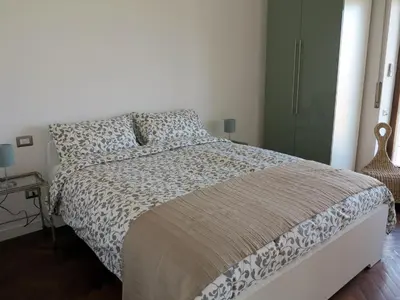 Letto o letti in una camera di Pretty panoramic apartment - half way Center-Vomero district
